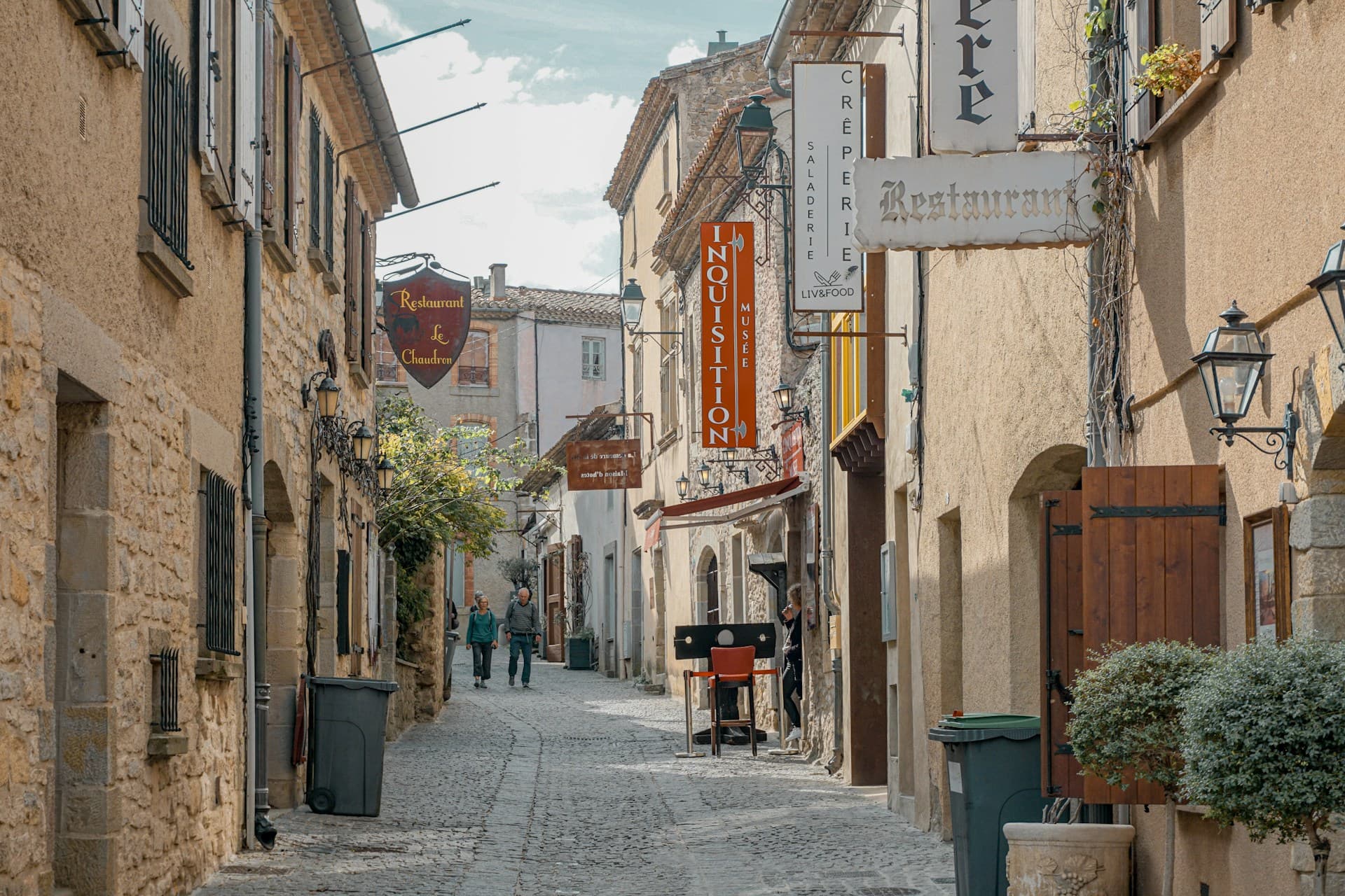 Carcassonne old town street with medieval buildings on a day trip from Toulouse