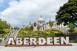 Aberdeen city sign with Marischal College in the background, Scotland travel guide