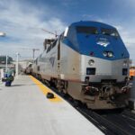 Amtrak long distance sleeper train at a station platform in the United States