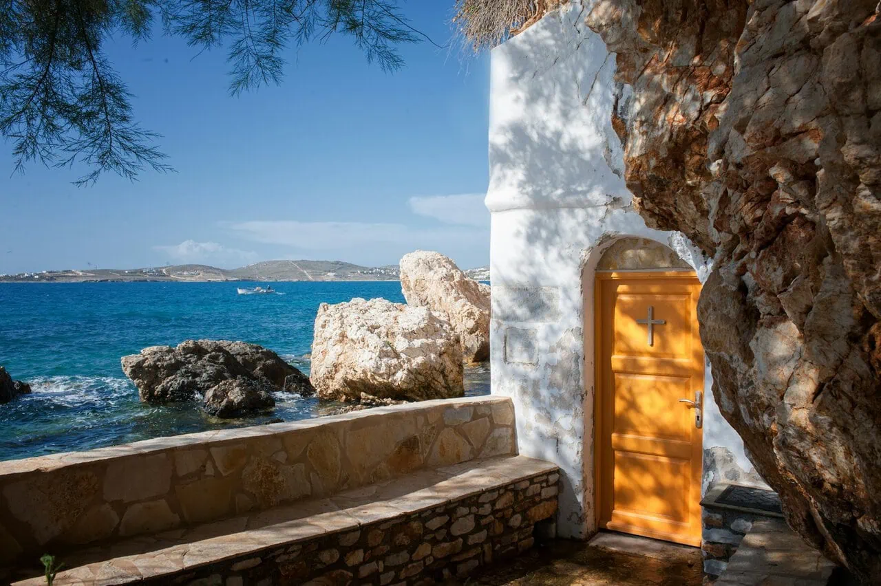 coastal chapel Paros Greece near sea Athens ferry routes