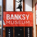 Banksy Museum entrance in Kraków with iconic Girl with Balloon artwork