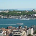 Bosphorus cruise boats sailing between Europe and Asia in Istanbul