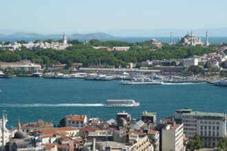 Bosphorus cruise boats sailing between Europe and Asia in Istanbul