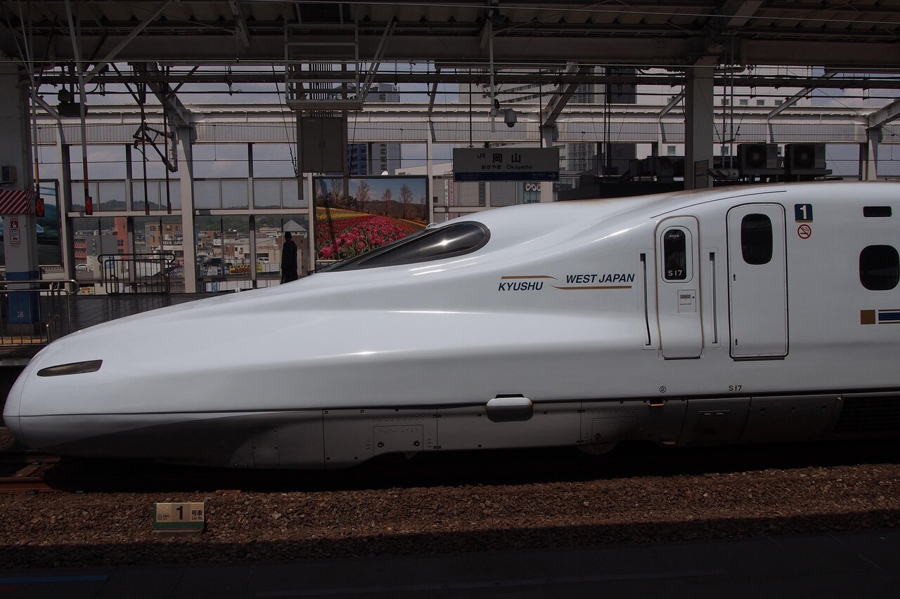 Japan Shinkansen bullet train at station platform covered by Japan Rail Pass