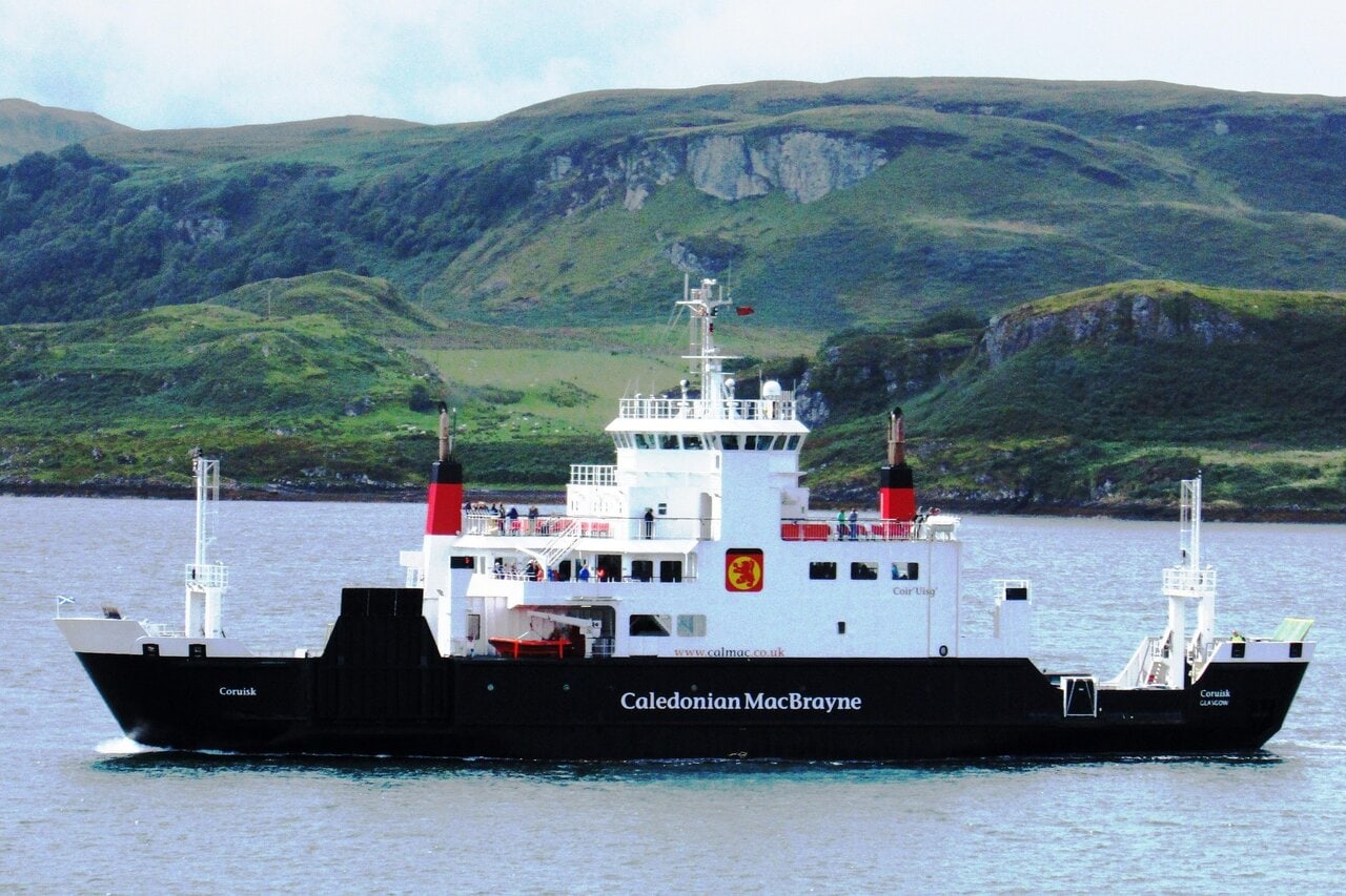 CalMac ferry sailing between Scottish islands in the Hebrides