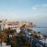 Ceuta promenade with palm trees and Mediterranean beach