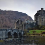 Dunvegan Castle on the Isle of Skye Scotland with stone bridge