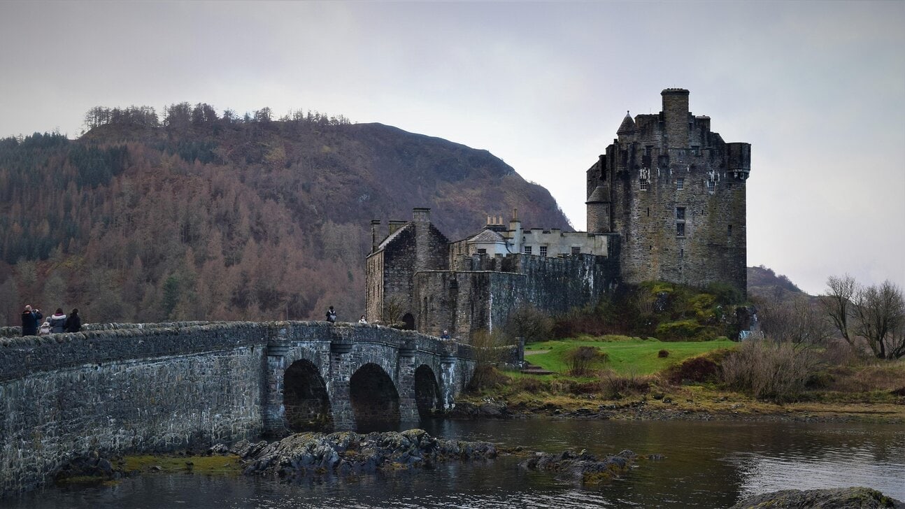 Dunvegan Castle on the Isle of Skye Scotland with stone bridge