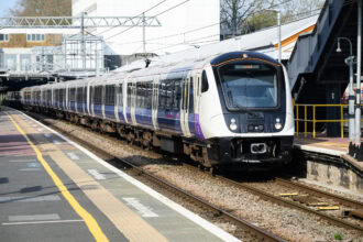Elizabeth line train at London suburban station platform