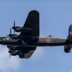 Avro Lancaster bomber flying over Elvington near York at the Yorkshire Air Museum
