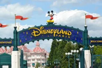 Disneyland Paris entrance sign visited via Eurostar from London