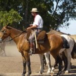 Gaucho riding horse at estancia ranch near Buenos Aires Argentina
