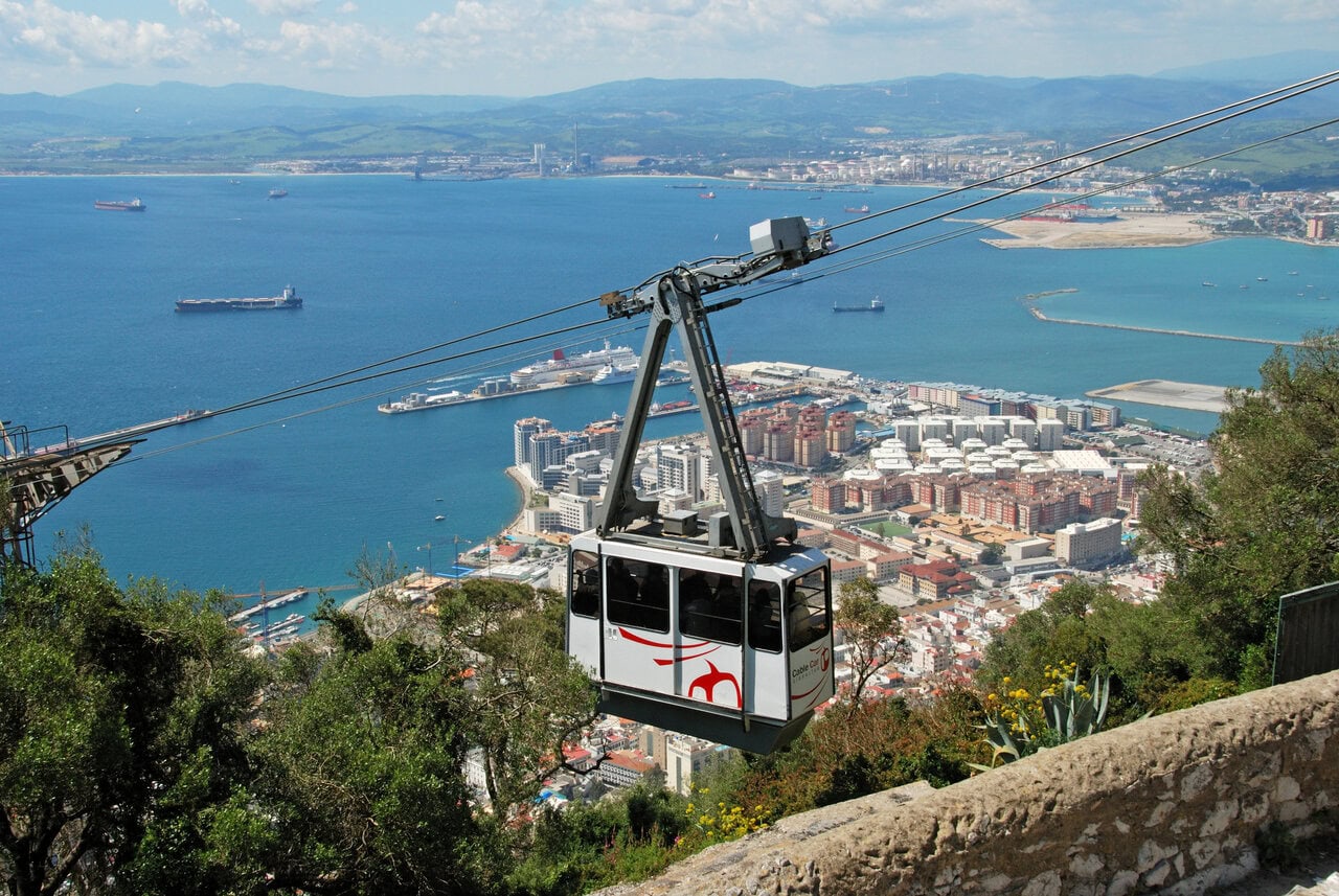 Gibraltar cable car above the city with views over the harbour and bay