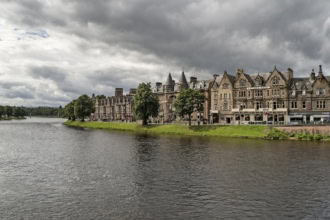 River Ness and riverside buildings in Inverness city centre Scotland