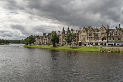 River Ness and riverside buildings in Inverness city centre Scotland
