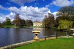 Kew Gardens lake and historic building in London