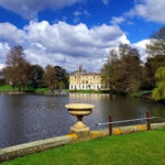 Kew Gardens lake and historic building in London