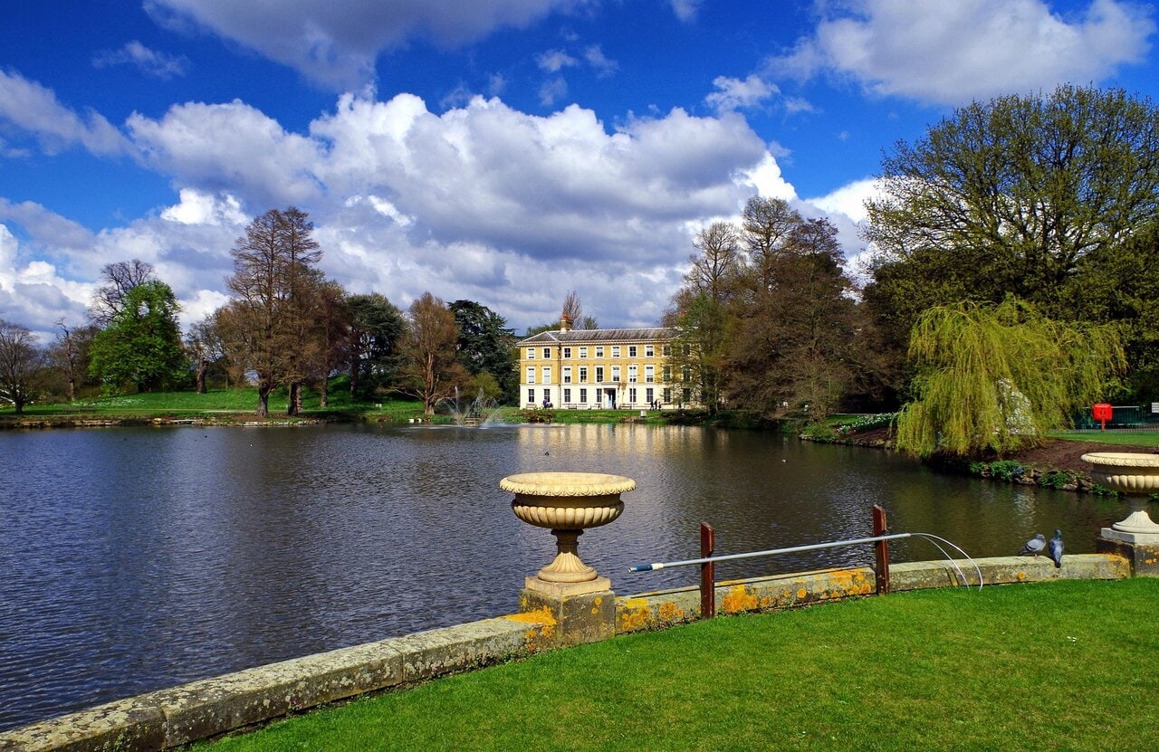 Kew Gardens lake and historic building in London