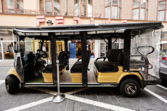 Electric golf cart tour vehicle in Krakรณw city centre
