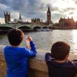 Children looking at Big Ben and the River Thames from the South Bank in London