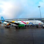 Wizz Air aircraft at London Luton Airport terminal