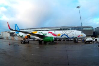 Wizz Air aircraft at London Luton Airport terminal