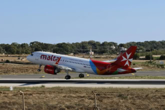 Air Malta aircraft landing at Malta International Airport