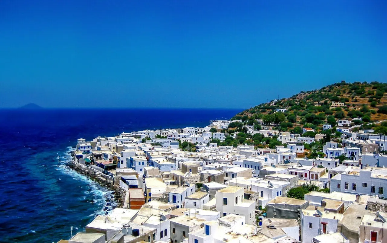 Nisyros island coastal village with white houses overlooking the Aegean Sea in Greece