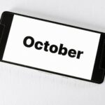 Best places to visit in October shown on smartphone screen