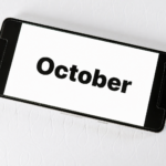 Best places to visit in October shown on smartphone screen