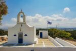 Traditional white chapel in Paros countryside Greece