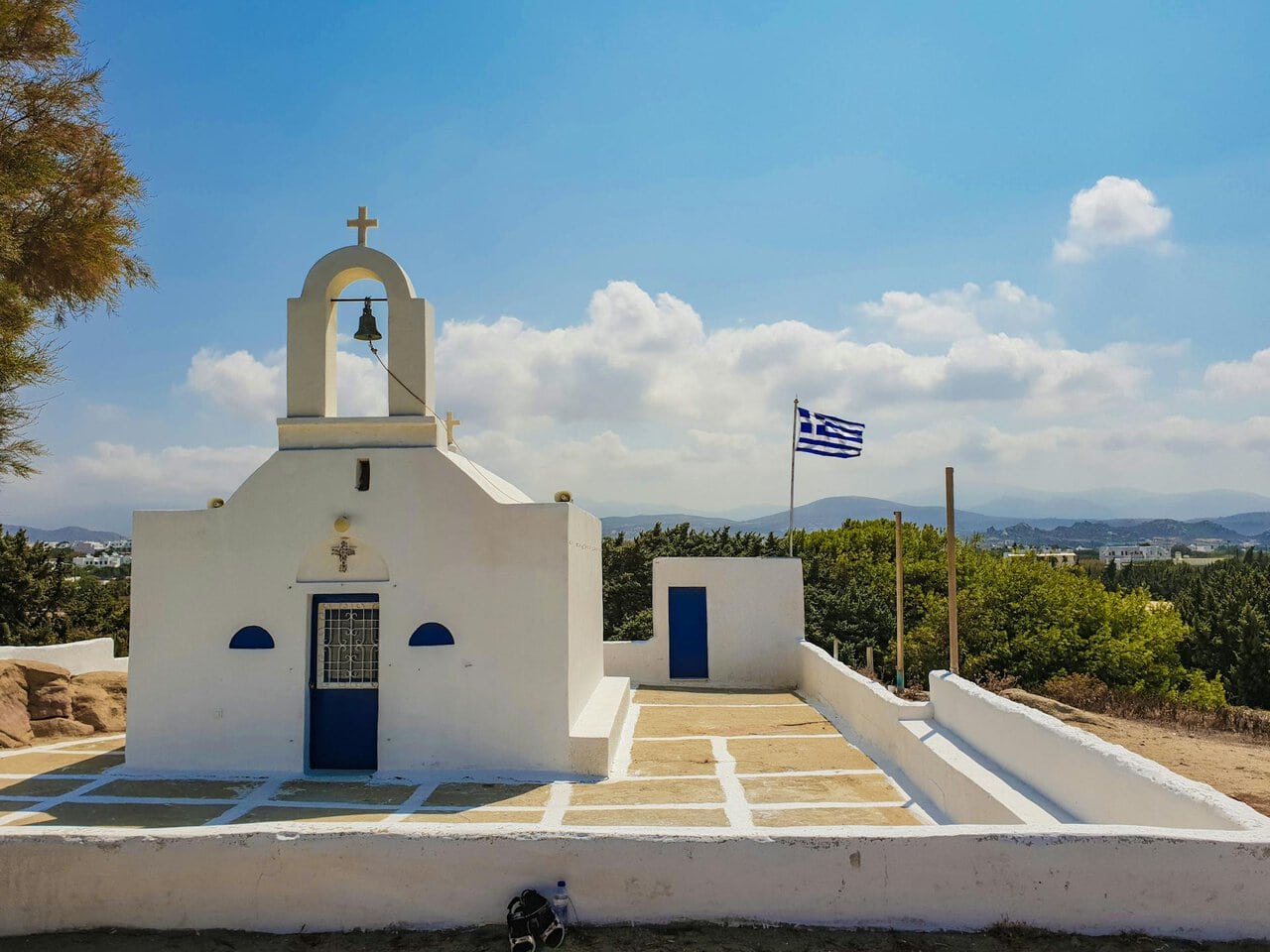 Traditional white chapel in Paros countryside Greece