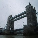 Tower Bridge in London seen through rain drops on a window on a rainy day