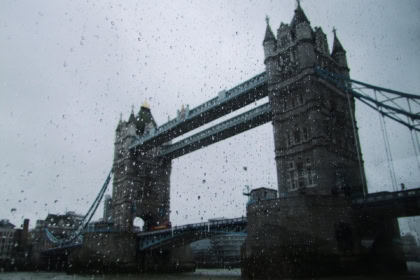 Tower Bridge in London seen through rain drops on a window on a rainy day