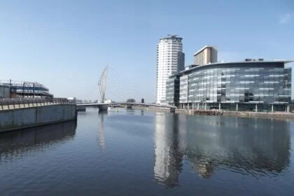 Salford Quays waterfront with MediaCityUK and modern buildings along the Manchester Ship Canal