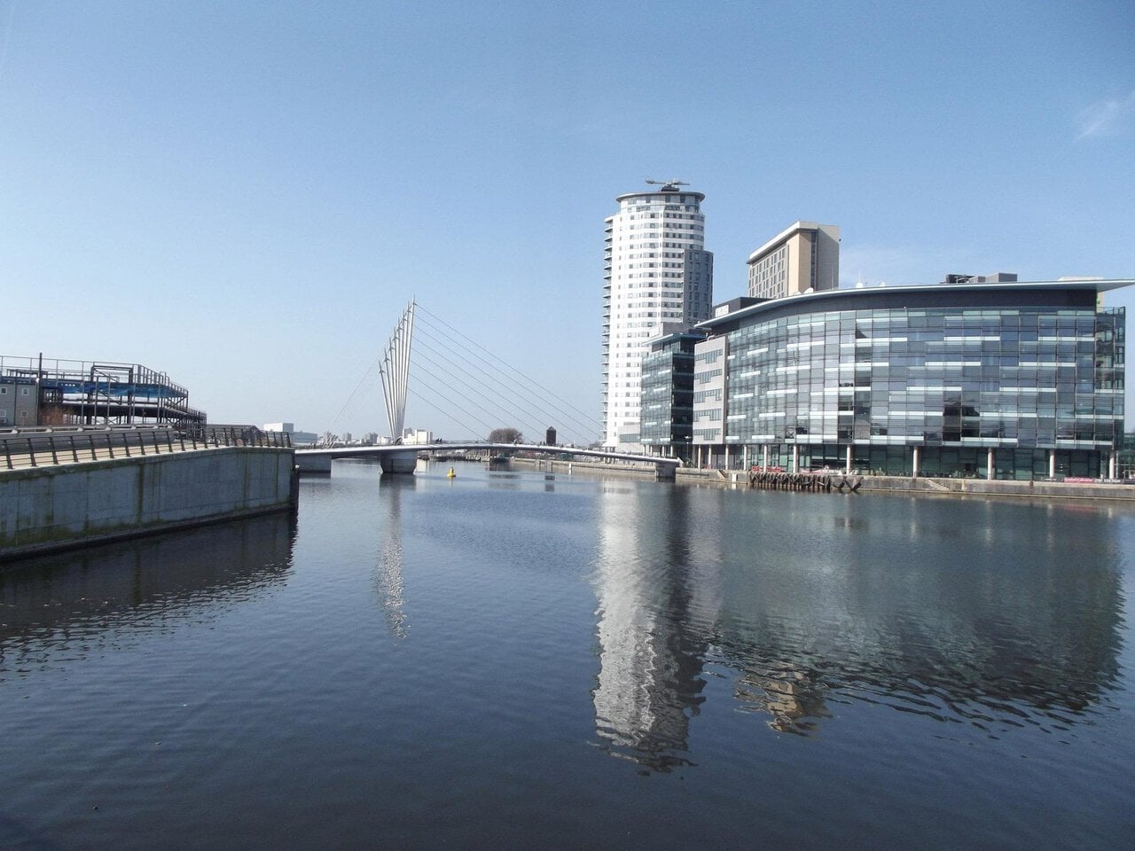 Salford Quays waterfront with MediaCityUK and modern buildings along the Manchester Ship Canal
