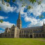 Salisbury Cathedral exterior with tallest spire in England viewed from Cathedral Close