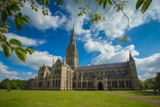 Salisbury Cathedral exterior with tallest spire in England viewed from Cathedral Close