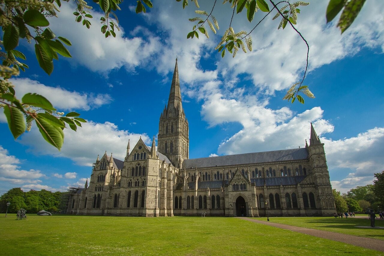 Salisbury Cathedral exterior with tallest spire in England viewed from Cathedral Close