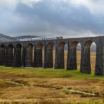 Settle to Carlisle railway train crossing Ribblehead Viaduct Yorkshire Dales