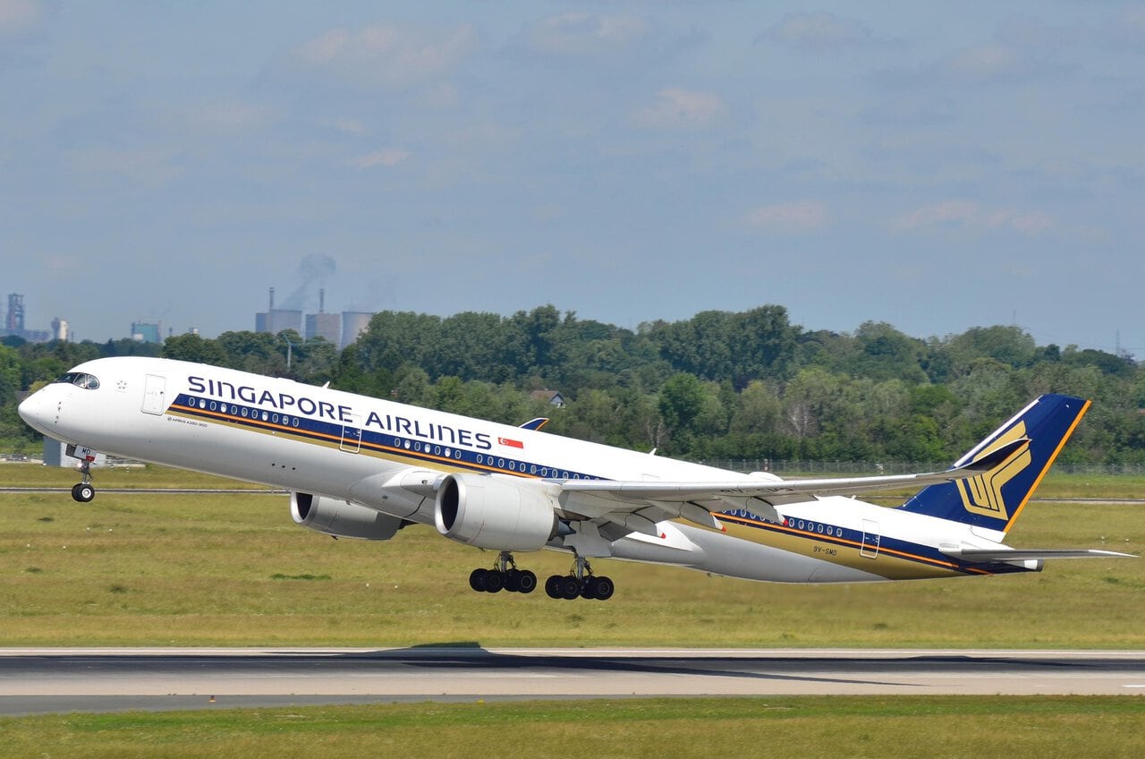 Singapore Airlines aircraft taking off from runway