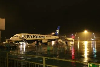 Ryanair aircraft at London Stansted Airport at night