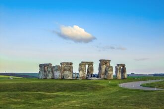 Stonehenge Wiltshire viewed on a day trip from London with visitor path and surrounding countryside
