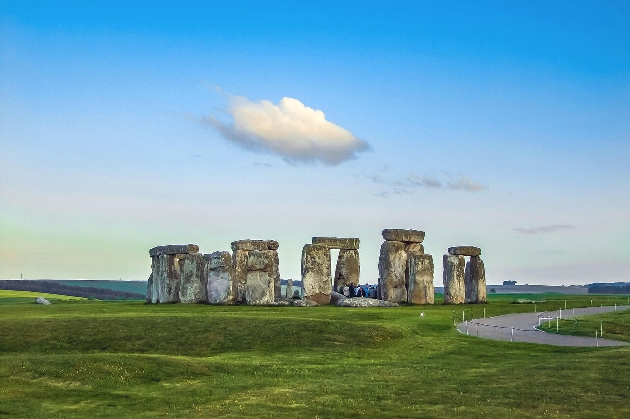 Stonehenge Wiltshire viewed on a day trip from London with visitor path and surrounding countryside