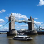 Tower Bridge London with Thames River cruise boat on the River Thames