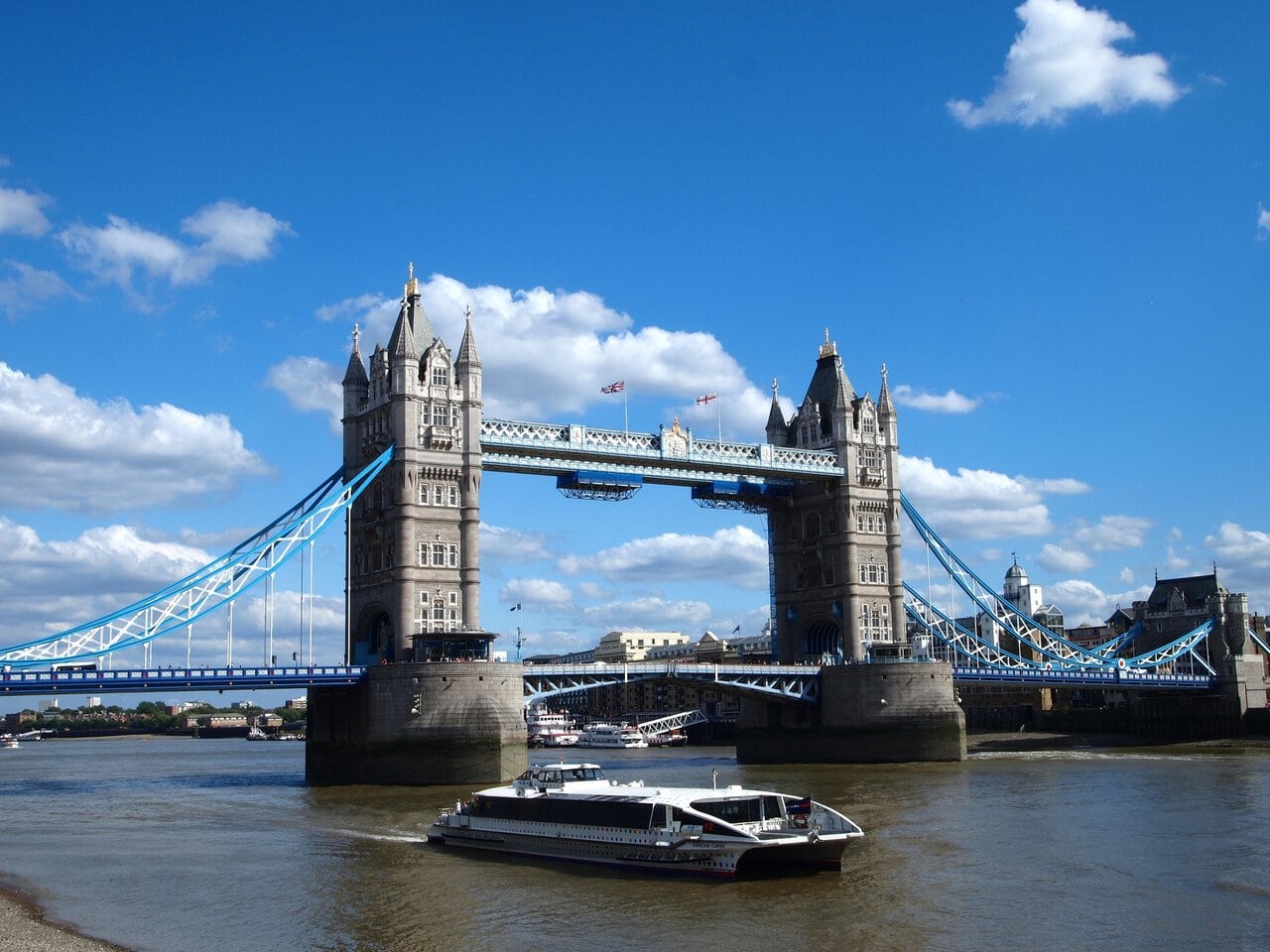 Tower Bridge London with Thames River cruise boat on the River Thames