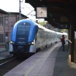 Polish regional train at station platform – Poland rail travel with Koleo app