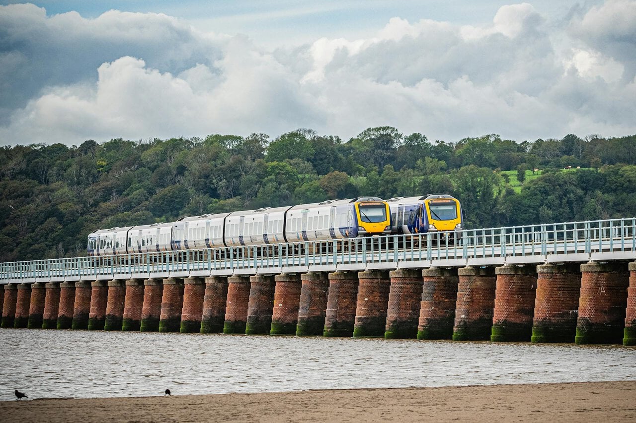 Train crossing Barmouth Bridge on Cambrian Coast Line in Wales