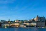 Waterfront skyline of Stockholm viewed across the Baltic waterfront under a clear blue Scandinavian sky