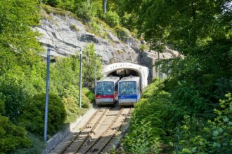 Flรธibanen funicular railway climbing Mount Flรธyen in Bergen Norway